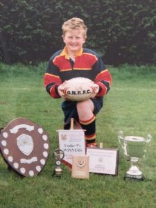 Young Zac with trophies