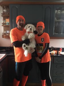 Man, woman and dog in baczac beanies