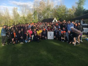 large group of people in baczac t-shirts