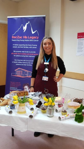 Woman at baczac bake sale